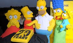 The Simpsons characters at an anniversary party